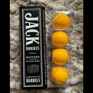 Jack Daniel’s collectible tin with  4 basketball ice sphere molds.